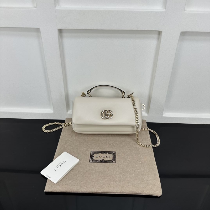 G*u*i top handle bags